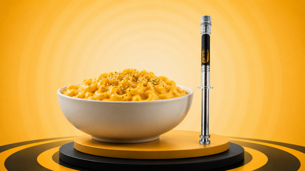 Pinpoint FECO Syringe next to mac & Cheese